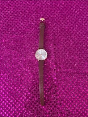 light brown and gold wristwatch